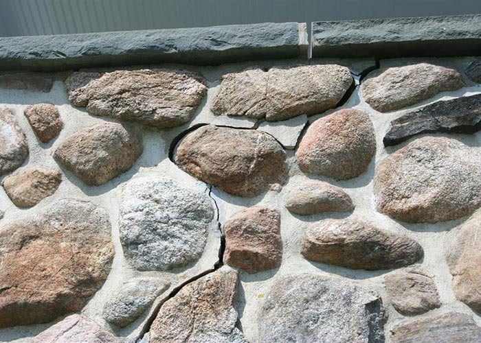 Cracked foundation from vibratory compactor